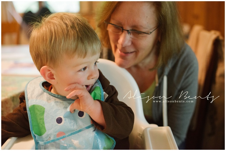 boy with elephant bib gets snuggles from grandma with glasses | MSP family photographer