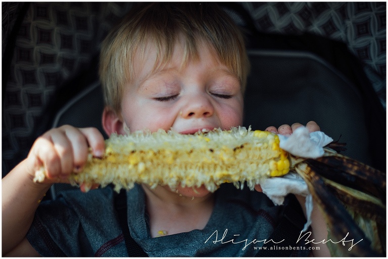 boy eating corn on the cob