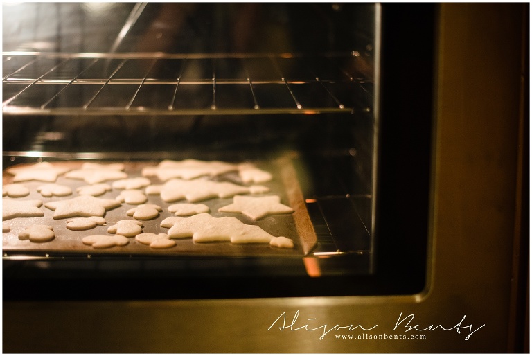 christmas cookies baking in an oven