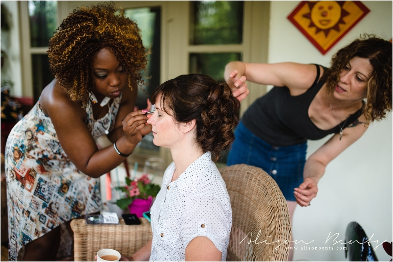 Bride gets primped | Minneapolis Wedding Photographer